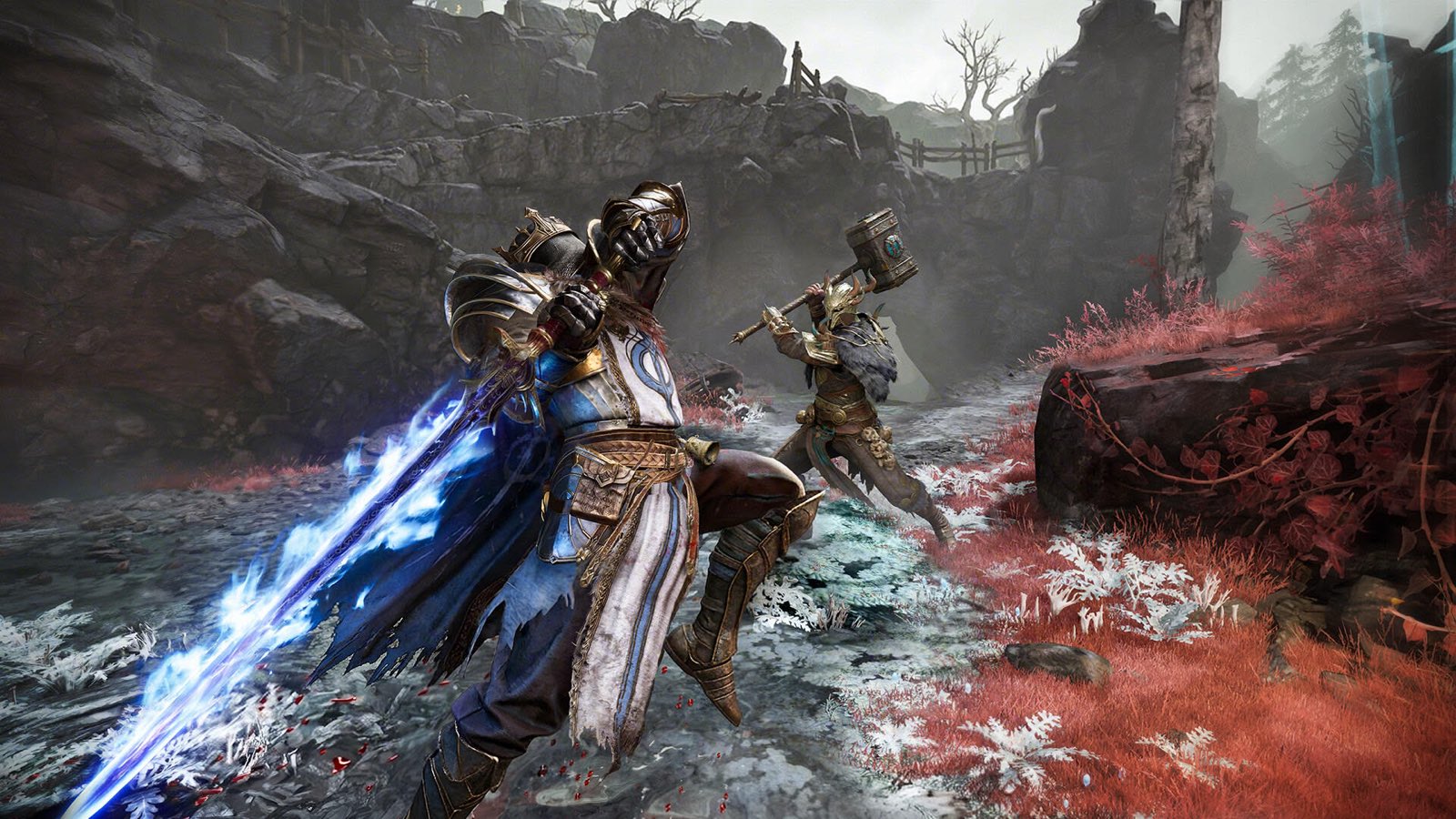 A caster with a glowing blade facing a Gyldhunter swinging a two-handed hammer
